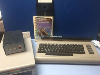 Vintage Commodore 64 Computer With Floppy Disk Drive,  Power Unit,  Cords & Book