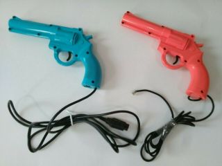 Sega Genesis Vintage Blue & Pink Official Konami Justifier Light Guns
