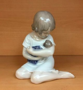 Vintage Royal Copenhagen Porcelain Figurine " Girl With Doll In Her Arms " 1938