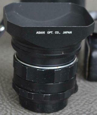 Asahi - Multi - Coated Takumar 1:3.  5 28mm Lens W/ Case/hood/caps/filter