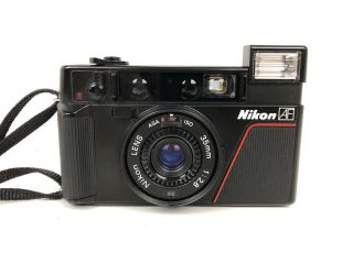 Nikon L35af L35 2.  8 / 35mm Slr Analog Vintage Compact Film Camera W/ Cap