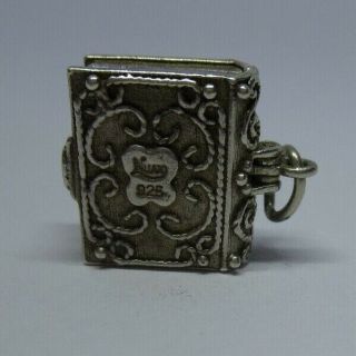Vintage silver holy bible charm,  opens to reveal Virgin Mary and baby Jesus,  nuvo 2