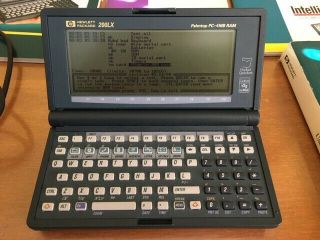 Hp 200lx Palmtop Pc 4mb Ram With Serial Cable,  Books,  Box.