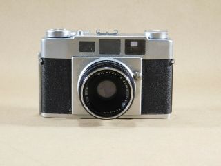 Olympus 35 - S camera w/ E.  Zuiko 1:2,  8 f=4.  8 cm lens 2