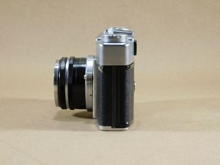 Olympus 35 - S camera w/ E.  Zuiko 1:2,  8 f=4.  8 cm lens 3