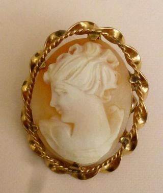 A Vintage Rolled Gold Brooch Set With A Shell Cameo