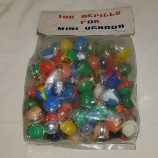 Vintage 100 Refills Mini Vendor Plastic Gumball Charms Nrfp Hong Kong $16.  99