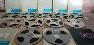 11 Reel to Reel Tapes.  9 Aluminum and 2 Plastic 10.  5 inch recorded music. 2