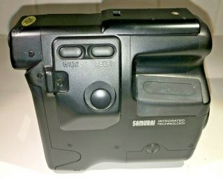 Yashica Samurai X3.  0 Half - Frame SLR for 35mm film with case,  all black,  1980s 6