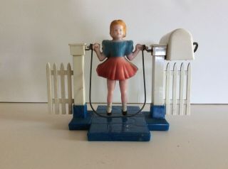 Vintage 1950s Plasco Toy Wind - Up Girl Jumping Rope By Fence,  Hard Plastic