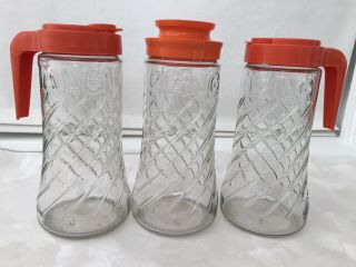 Vintage Tang Glassware Swirl Glass Pitcher Jar Container Orange Lid Set Of 3