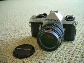Vintage Pentax Me 35 Mm Camera With A Smc Pentax - M 1:1.  7 50mm Lens