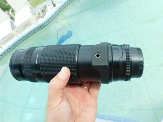 Nikon AF Nikkor 75 - 300mm lens Promaster Spectrum 7 62mm Skylight 1A 7