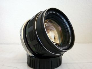 Minolta Mc Rokkor - Pf 58mm F/1.  4 Lens,  D55na Hood,  & F55na Uv Filter