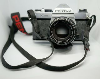 Pentax Asahi K1000 35mm Film Camera W/1:1.  7 50mm Lens And Uv Lens Cover