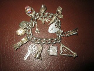 Vintage Heavy Solid Silver Charm Bracelet 107 Grams 15 Charms