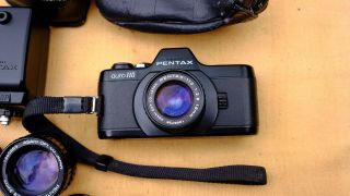 Vintage Pentax Auto 110 Camera,  3 lenses,  Flash 4