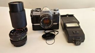 Canon AE - 1 35mm Camera with FD 50 mm f/1.  8 Lens & Power Winder & 2 extra lens 2