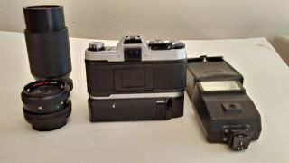 Canon AE - 1 35mm Camera with FD 50 mm f/1.  8 Lens & Power Winder & 2 extra lens 4