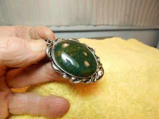 Vintage Design Unmarked Silver Tone Polished Green Stone Hang - Up Pendent Nochain