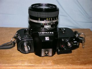 Nikon EM Black Camera with Nikon Nikkor 50mm f1.  4 Lens & 4