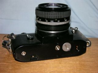 Nikon EM Black Camera with Nikon Nikkor 50mm f1.  4 Lens & 5