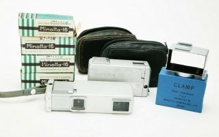 Vintage Two Minolta - 16 16mm Film Cameras With Useful Accessories.