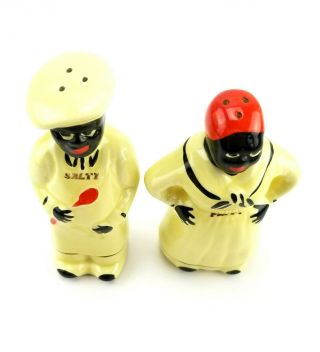 Vintage Black Americana Salty and Peppy Chef Yellow Salt and Pepper Shakers bt 2