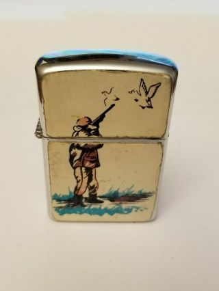 Lighter W/ Sticker Of A Duck Hunter,  Vintage Brown & Bigelow,  Windmaster