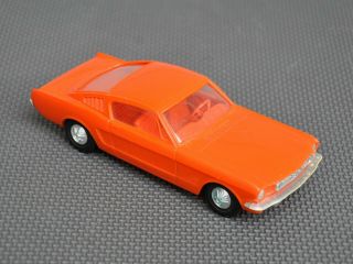 Vintage 1965 Ford Mustang Fastback Processed Plastics Model Car Toy Orange 1/25