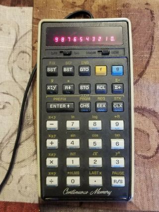 HP 25C Calculator with Bonus With case,  charger,  and manuals.  Includes HP 31E 2