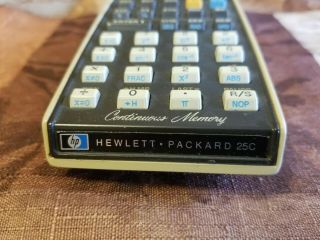 HP 25C Calculator with Bonus With case,  charger,  and manuals.  Includes HP 31E 4