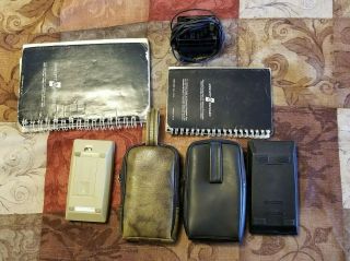 HP 25C Calculator with Bonus With case,  charger,  and manuals.  Includes HP 31E 7
