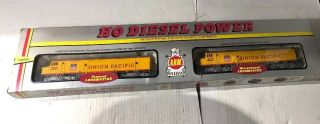 A.  H.  M.  Ho Scale Diesel Power Union Pacific Lighted Locomotive & Dummy 2 Pack Vtg