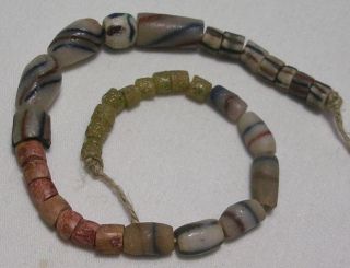 34 AFRICAN TRADE BEADS ASST MAINLY WHITES STRAND W BAUXITE SOME VINTAGE SOME 2