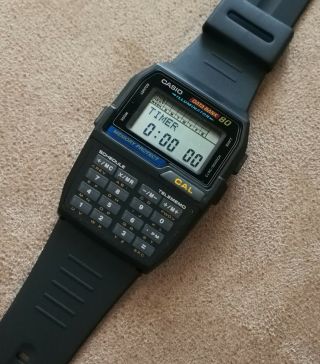 vintage casio dbc - 80 calculator databank telememo alarm chrono lcd watch qw - 1486 5