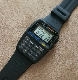 vintage casio dbc - 80 calculator databank telememo alarm chrono lcd watch qw - 1486 6