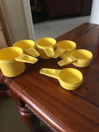 6 Vintage Tupperware Yellow Measuring Cups