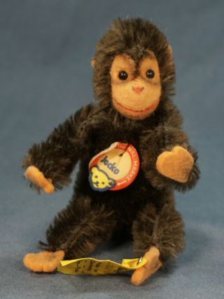 Vintage Steiff Jocko Chimp 4” Bendy Brown Chest Label.  Tag 0020/11