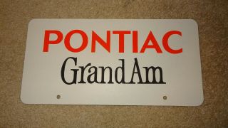 Vintage 1973,  1974,  1975,  1978,  1979,  1980 Pontiac Grand Am Dealer License Plate