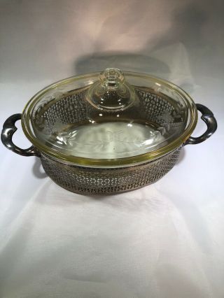 vintage Pyrex casserole dish with lid In Silver Plated Carrier 2