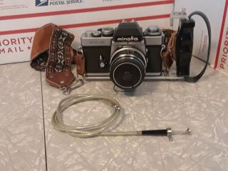 Minolta Xe - 5 35 Mm Camera With Minolta Mc Rokkor - Pf1:1.  7f=55mm Lens