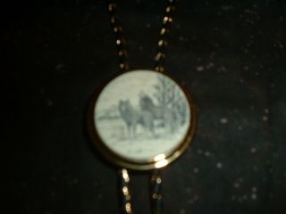 VINTAGE BARLOW BOLO TIE with SCRIMSHAW SLIDE of A WOLVES IN THE WILD 2