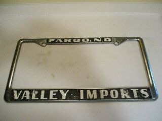 Valley Imports Fargo,  N.  D.  Vintage Metal License Plate Frame