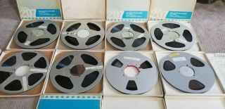 8 Reel to Reel Tapes.  7 Aluminum and 1 Plastic 10.  5 inch recorded music. 2