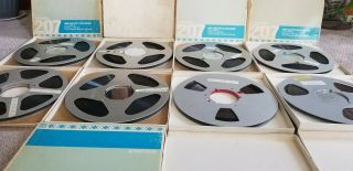8 Reel to Reel Tapes.  7 Aluminum and 1 Plastic 10.  5 inch recorded music. 3