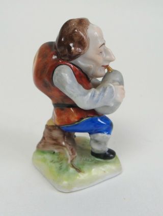 Good vintage German Volkstedt porcelain figure of a Hunchback bagpipe player 2