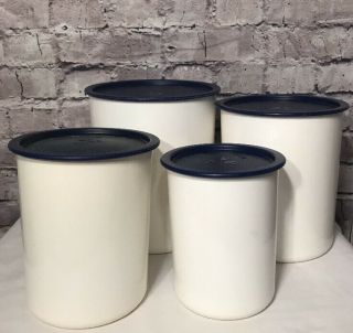 Tupperware Vintage Set Of 4 Stackable White Canisters With Blue Lids
