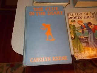 7 Vintage Nancy Drew books,  1930s editions,  blue covers w/ orange silhouette 3
