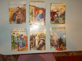 7 Vintage Nancy Drew books,  1930s editions,  blue covers w/ orange silhouette 5